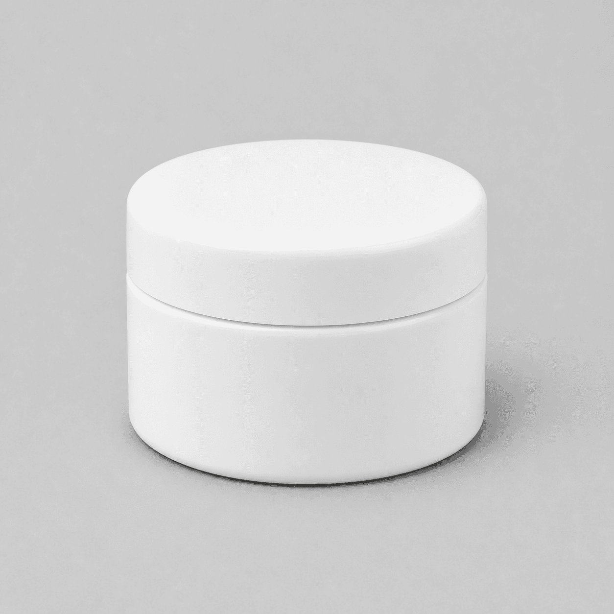 1" x 1" Tiny hard-good decal preview on generated blank white cosmetic jar mockup